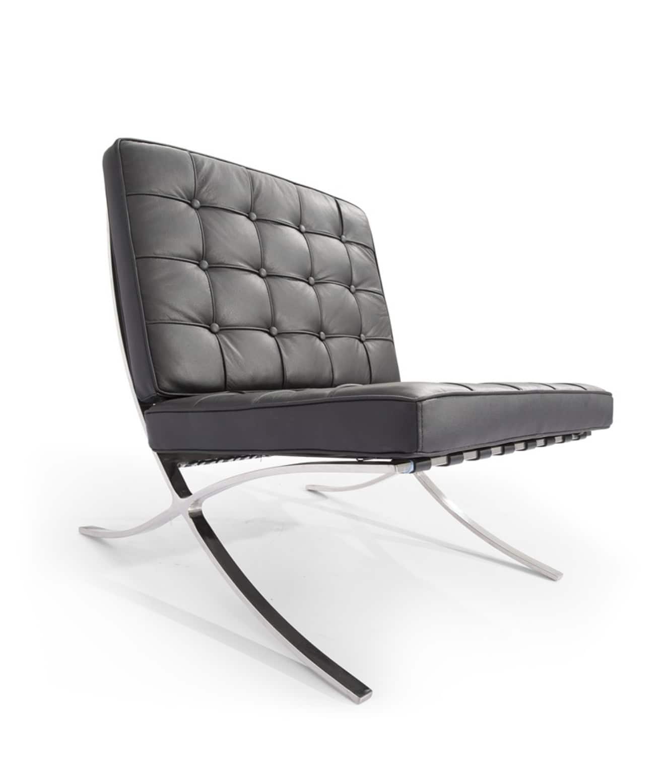 Black leather lounge chair with tufted upholstery and sleek metal frame.