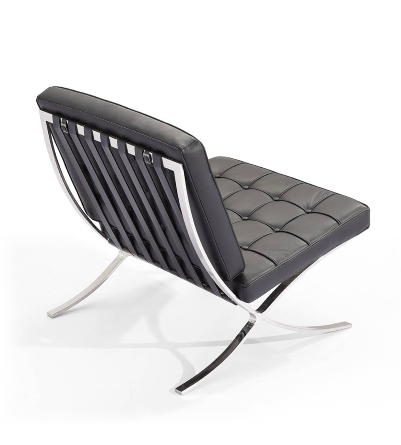 Stylish black leather lounge chair with sleek metal frame for modern home decor.
