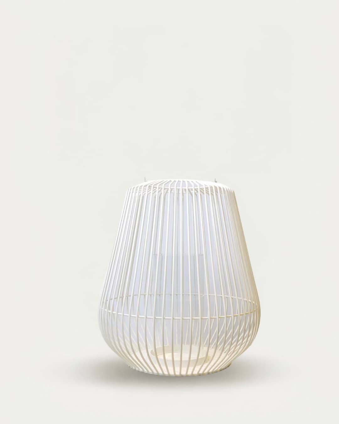 Large white hurricane-inspired decorative lantern with open slatted design.