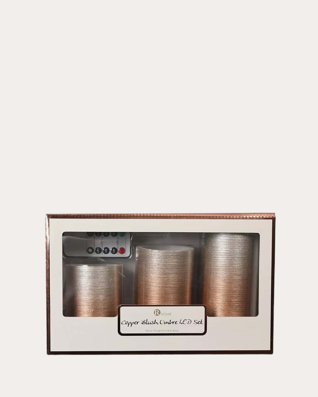 Elegant silver and cashmere LED candle set with ombre finish, perfect for cozy home decor.