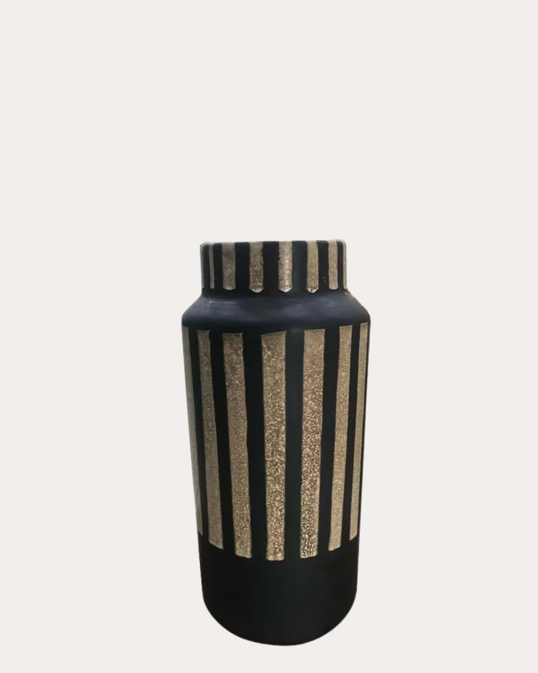 Black striped ceramic vase with gold accents, modern decorative home accessory.