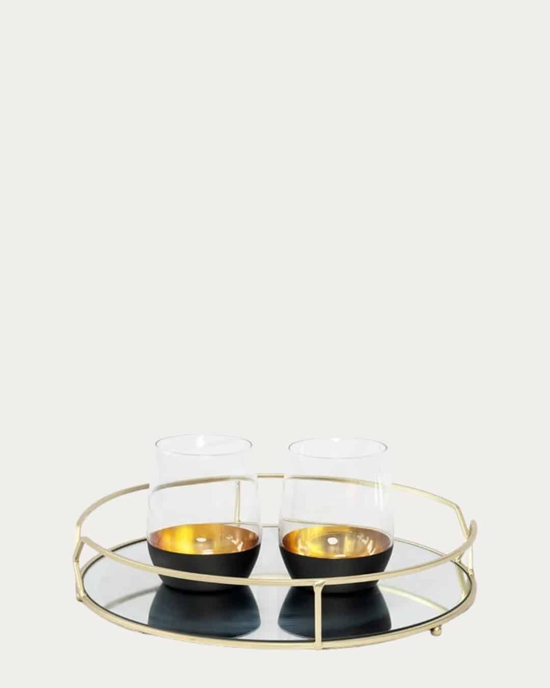 Elegant set of 4 Zari tumbler glasses with gold accents, perfect for stylish beverage presentation.