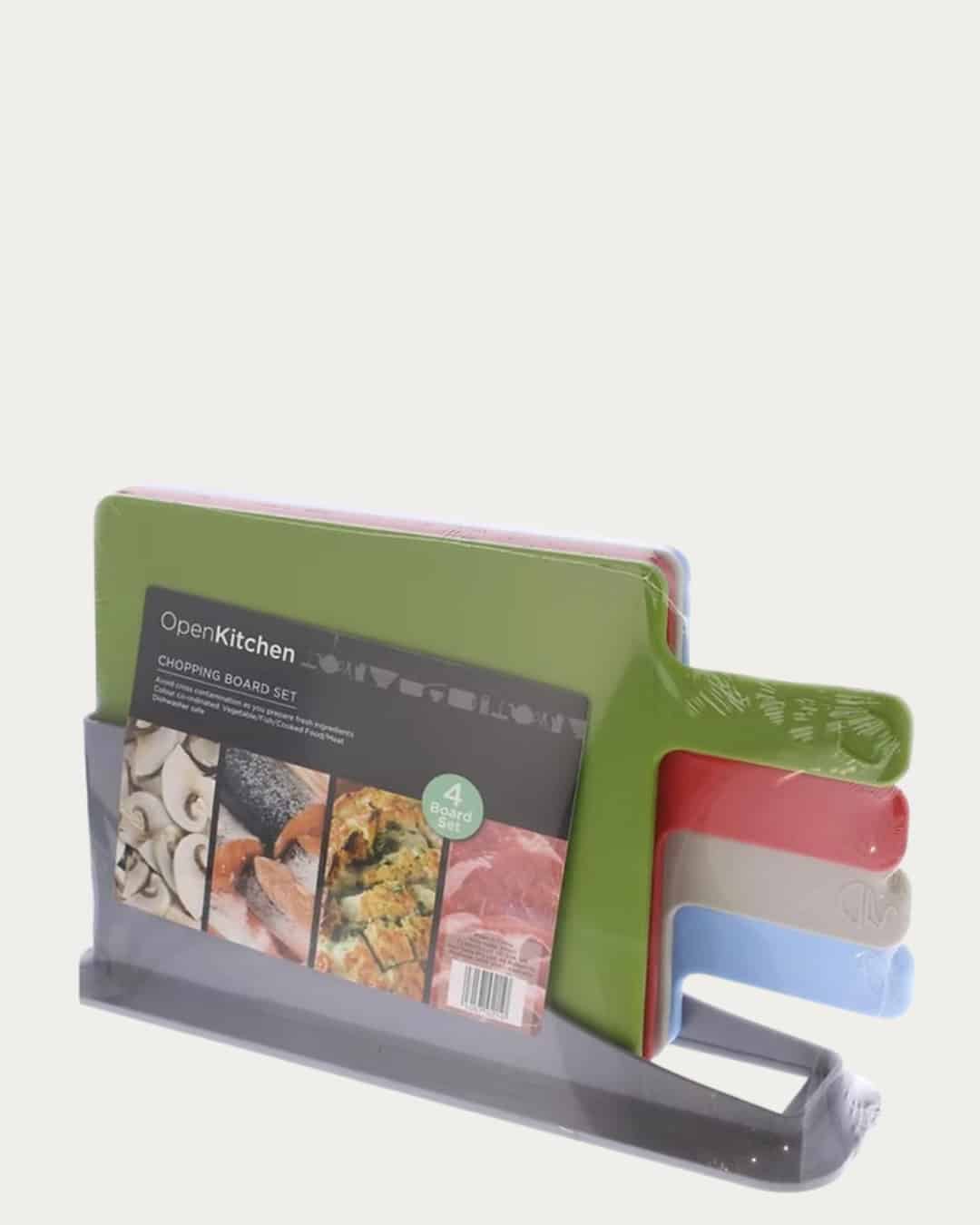 Open kitchen chopping board set with four colorful cutting boards in green, red, beige, and blue, di.