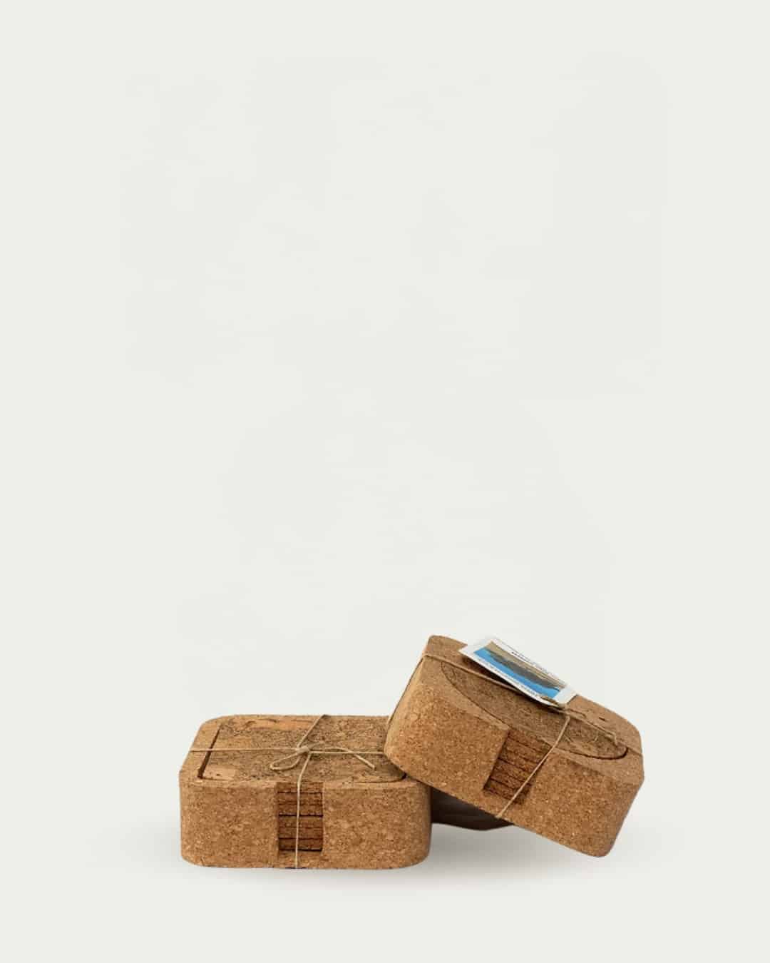 Eco-friendly cork drink coasters with a minimalist design for six-pack brown drinks.
