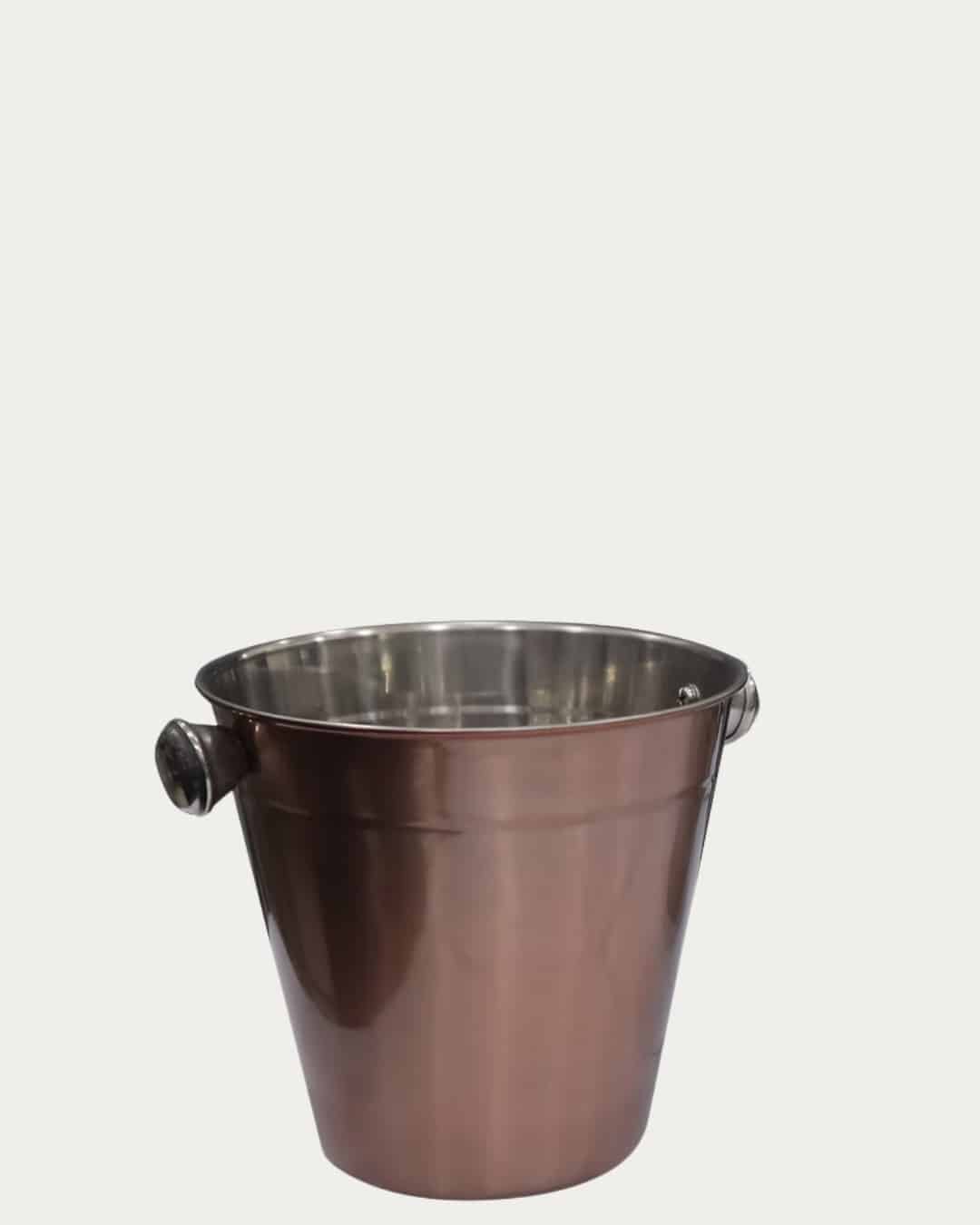 Copper and silver ice bucket for elegant beverage presentation and chilling.