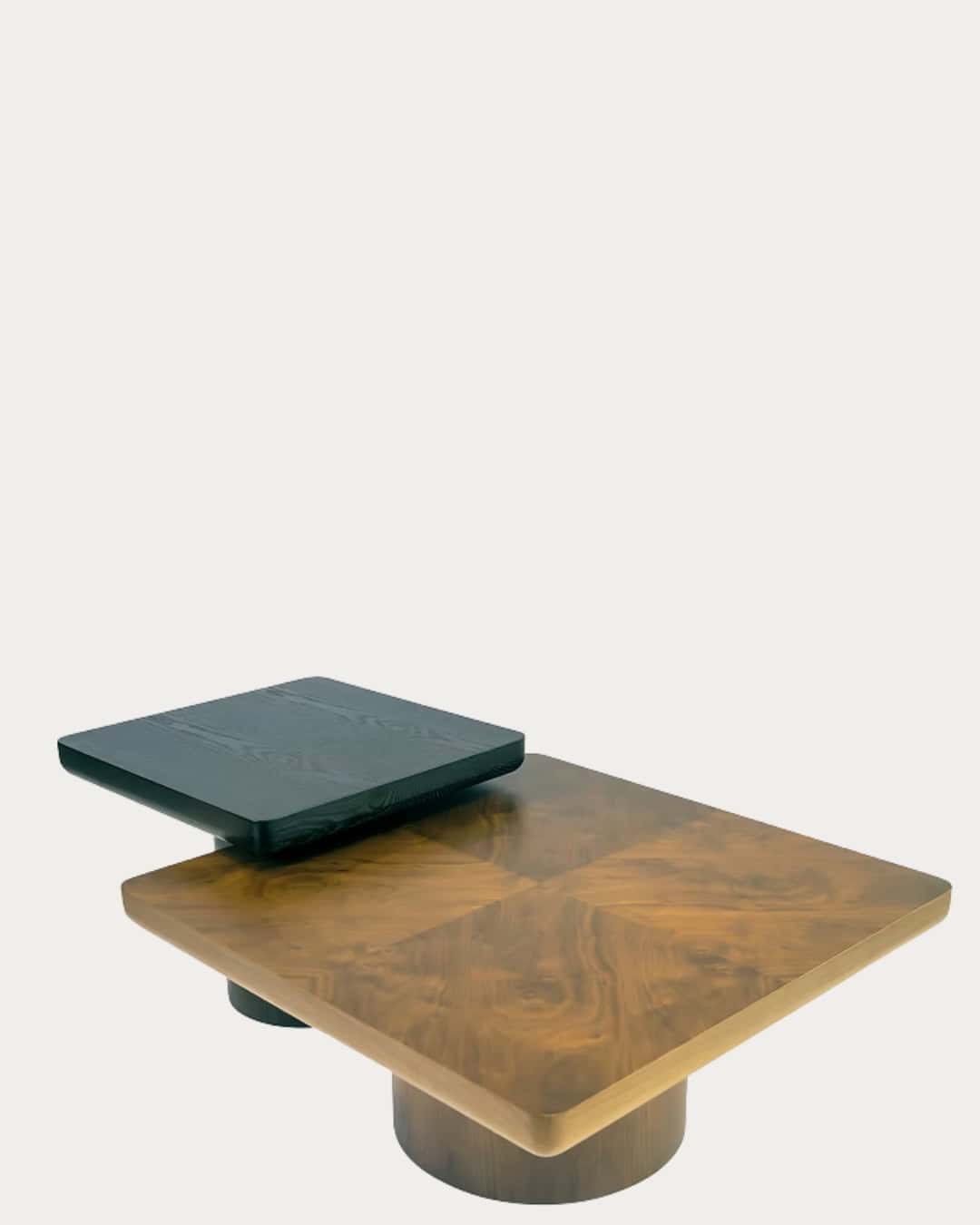 Modern black and wood coffee table with geometric design for living room decor.