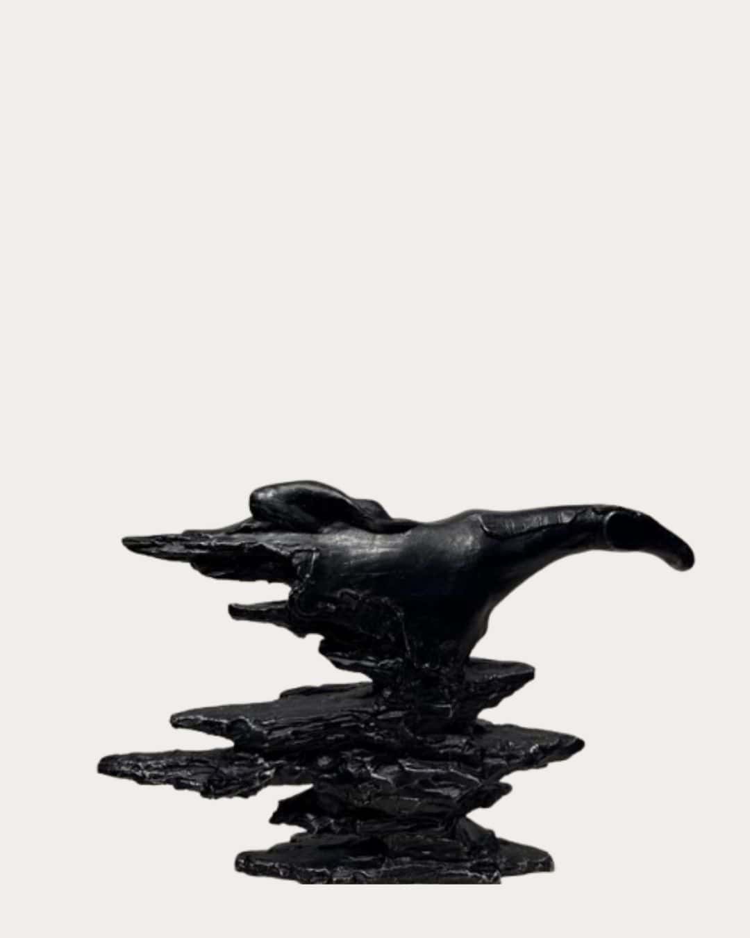 Black Rock Resin Sculpture, modern black abstract art piece, perfect for home decor or garden accent.