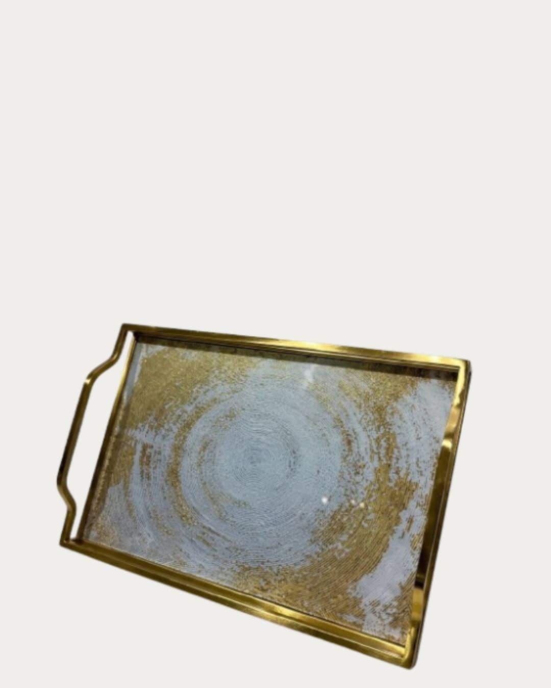 Gold and metal rectangular tray with circular gold design, decorative home accent.