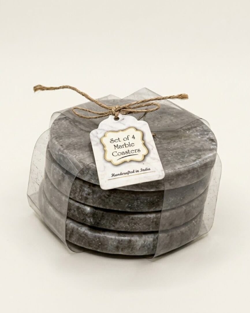 Set of 4 grey marble coasters with gold accents in a clear gift box.