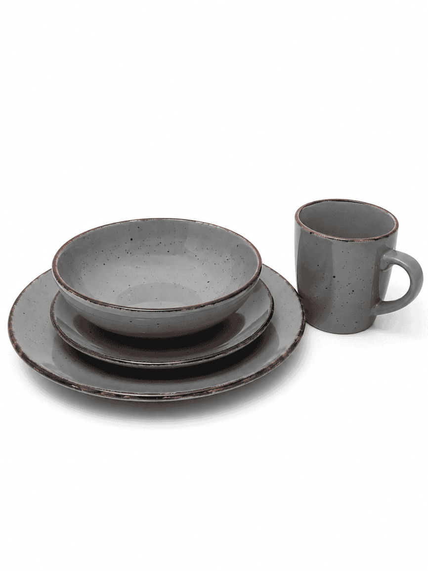 Set of grey speckled dinnerware including plates, bowls, and mug for stylish dining.