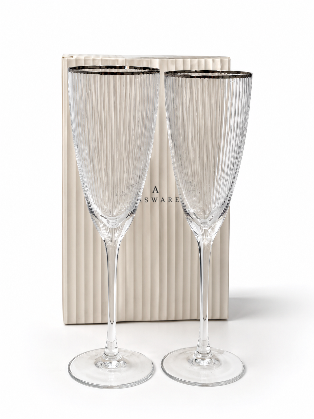 2PC Silver Rim Tall Deco Flutes with ribbed glass design and slender stems Select 80 more words to run Humanizer.